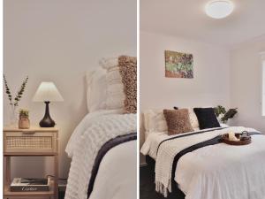 RosettaModern holiday home in Hobart - Stunning Mountain & Water views的一间卧室配有两张床和一张带台灯的桌子