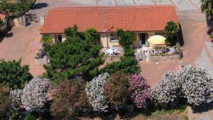 圣塔·马里亚·迪·帕尔玛Luna & Sole的享有花园房屋的空中景致