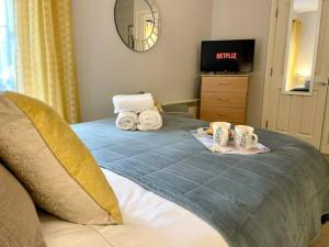 Cute and cosy studio in a Fantastic Location! BISHOPS STORTFORD客房内的一张或多张床位