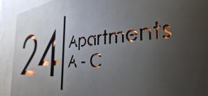 豪士罗Beautiful Apartment In London的墙上写有词典的标语