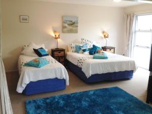 特玛希亚湾度假酒店客房内的一张或多张床位