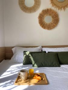 Chambre climatisée lit double dans villa - Proche Centre Tramway客房内的一张或多张床位