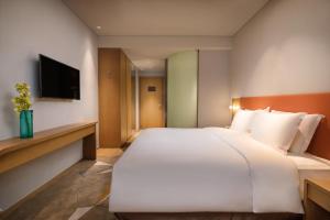 苏州新区智选假日酒店客房内的一张或多张床位