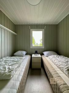 Close to nature cabin, sauna, Øyeren view, Oslo vicinity客房内的一张或多张床位