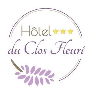 卢尔德Hôtel du Clos Fleuri的星星酒店和布兰字的标签