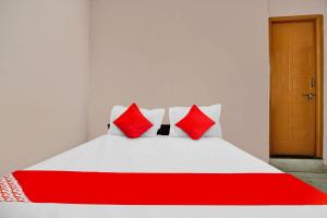 SPOT ON Cks Lodge客房内的一张或多张床位