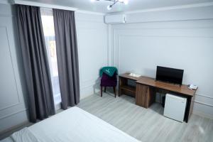 Hotel Borjomi客房内的一张或多张床位