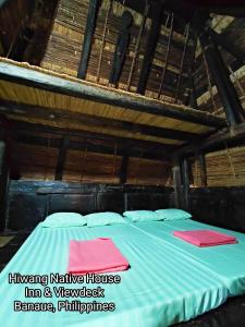 巴纳韦美景露台西望酒店的竹屋中带一张床的卧室