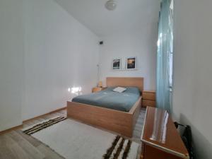 Nívó Apartman Siófok客房内的一张或多张床位