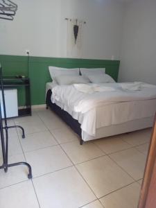Pousada Marinho Society客房内的一张或多张床位
