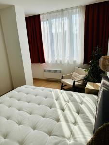 Urbanstay Suites - Grand Place 2 Bd Apartment的休息区