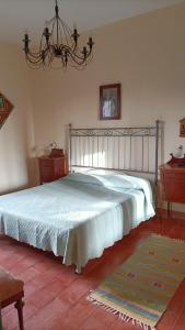 Casa Bomboniera客房内的一张或多张床位