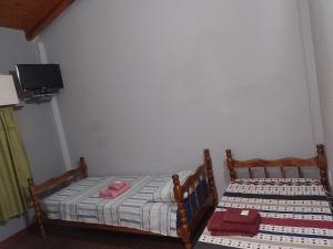 Hospedaje Los Laureles客房内的一张或多张床位