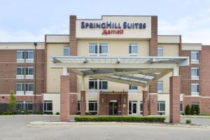 罗缪勒斯Springhill Suites by Marriott Detroit Metro Airport Romulus的 ⁇ 染春山套房奥斯汀建筑