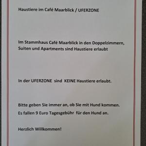 沙尔肯梅伦Hotel-Ferienwohnungen Cafe Maarblick的白纸上打字的文件