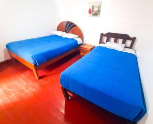 Peru Hostel Inn Plaza客房内的一张或多张床位