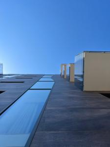 莱切Glass House - Smart Rooms & Parking的建筑屋顶的景色