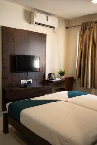 Catalyst Suites, Rajaji Nagar客房内的一张或多张床位