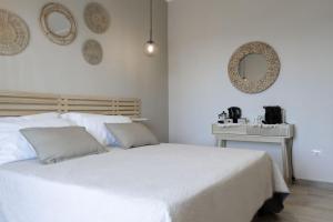 Sunrise Sardinia Posada客房内的一张或多张床位