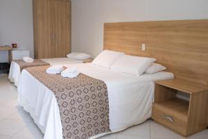Granville Eco Resort客房内的一张或多张床位