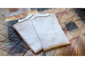 贝冢市Sunrise Inn - Vacation STAY 75396v的睡床上的白色餐巾