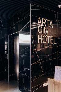 Arta City Hotel的证书、奖牌、标识或其他文件