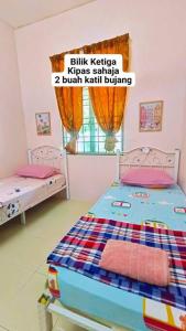 Hmsty D Hutan Kampung Alor Setar (Muslim)客房内的一张或多张床位