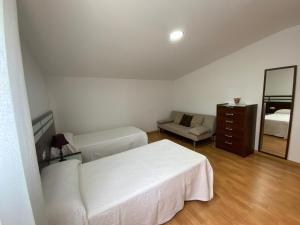 Pensión Beiramar客房内的一张或多张床位
