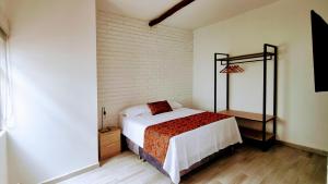 Hotel Casa Sab - San Fernando客房内的一张或多张床位