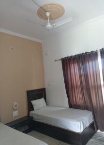 Aarambh Residency客房内的一张或多张床位