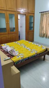 Ohm Shanthi Homestay客房内的一张或多张床位