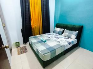 双溪大年Marvelous Homestay SP Kedah的卧室配有一张床