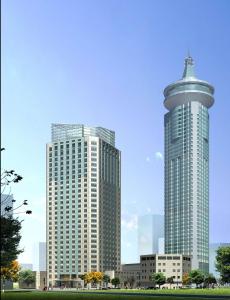 上海上海东锦江希尔顿逸林酒店（入住赠送欢迎曲奇）的城市两座高楼的景色