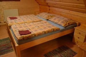 Chalupa Pohoda Slovenský raj Hrabušice客房内的一张或多张床位