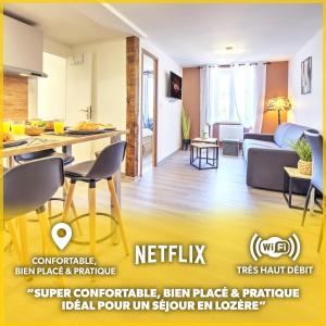 班纳萨克Le Sabot - Netflix/Wi-Fi Fibre/Terasse - 4 pers的公寓内的厨房和客厅的 ⁇ 染
