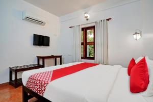 Flagship Cherai Panoramic Beach Hotel客房内的一张或多张床位