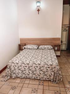 Pousada Estância Mineira客房内的一张或多张床位