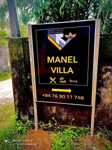 本托塔Manel Villa的田野上庄园别墅的标志