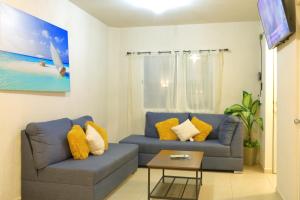 Casa familiar 3 habitaciones Playa del Carmen的休息区