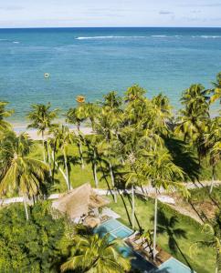 佩德拉斯港Zai Patacho的享有棕榈树海滩和大海的空中景致