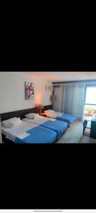 CORPUS A - Hotel Albatros客房内的一张或多张床位