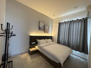 Sandakan SeaView-Suite Top Floor客房内的一张或多张床位