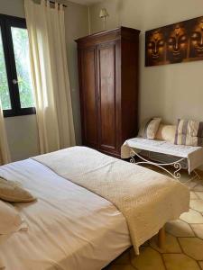 Villa Marie Cap Corse sentier douaniers客房内的一张或多张床位