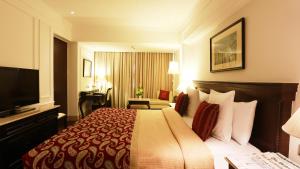 新德里阿育王酒店客房内的一张或多张床位