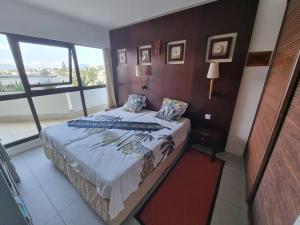 Appartement F3 sur l'anse vata, bord de mer客房内的一张或多张床位