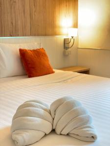 Laemsing Natural Beach Resort客房内的一张或多张床位