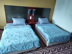 South China Sea Place Suites at Ming Garden, near Imago, Sutera Avenue KK客房内的一张或多张床位