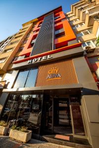 班德尔马CITY ASYA HOTEL的前面有标志的酒店