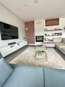 Douro Escape - Riverfront Apartment的休息区