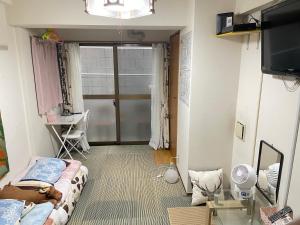新宿の家-畳み3人部屋的休息区
